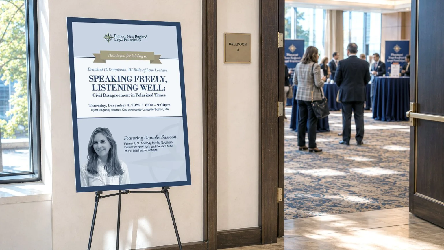 Easel sign for the Brackett B. Denniston III Rule of Law Lecture outside the ballroom